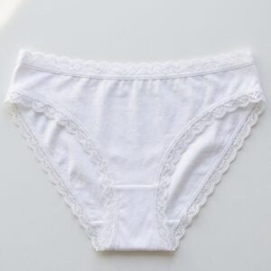 Braga bikini de algodón blanca con ribete de encaje